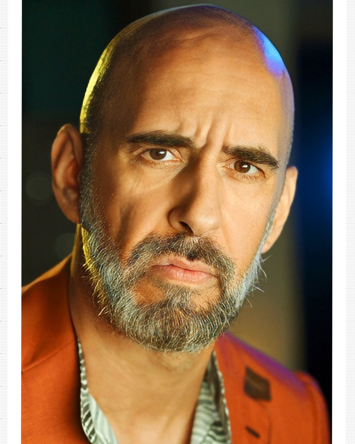 Andreas Pliatsikas in a colorful character portrait